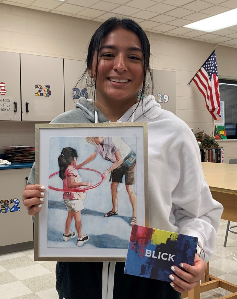 Olivia Hilton with her award winning watercolor